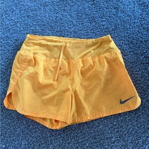 Yellow small Nike shorts